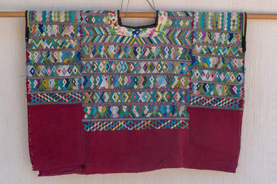 Blue and red San Juan Cotzal huipil for April