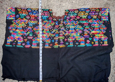 Colorful on black Nahuala huipil with horses