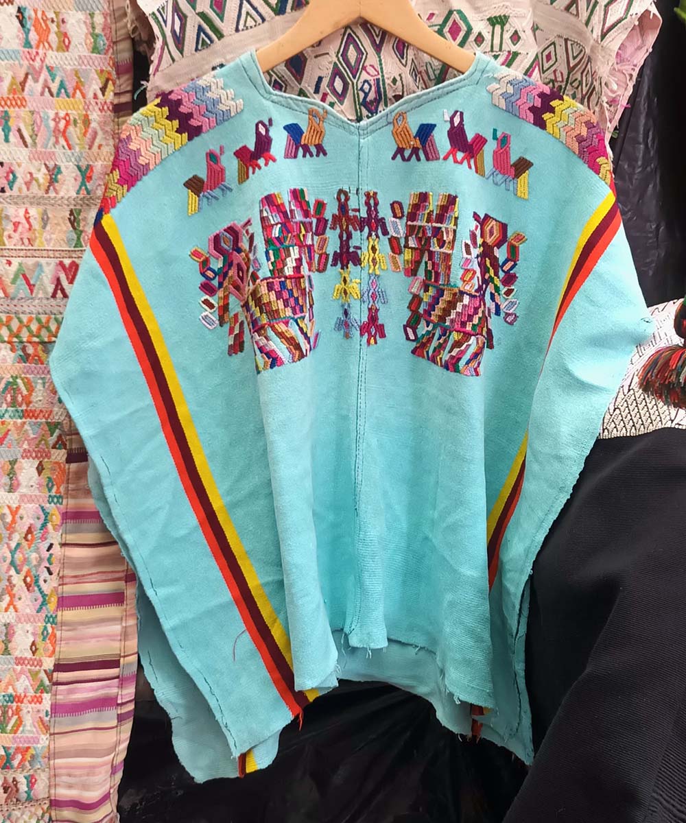 Bright blue Chajul huipil