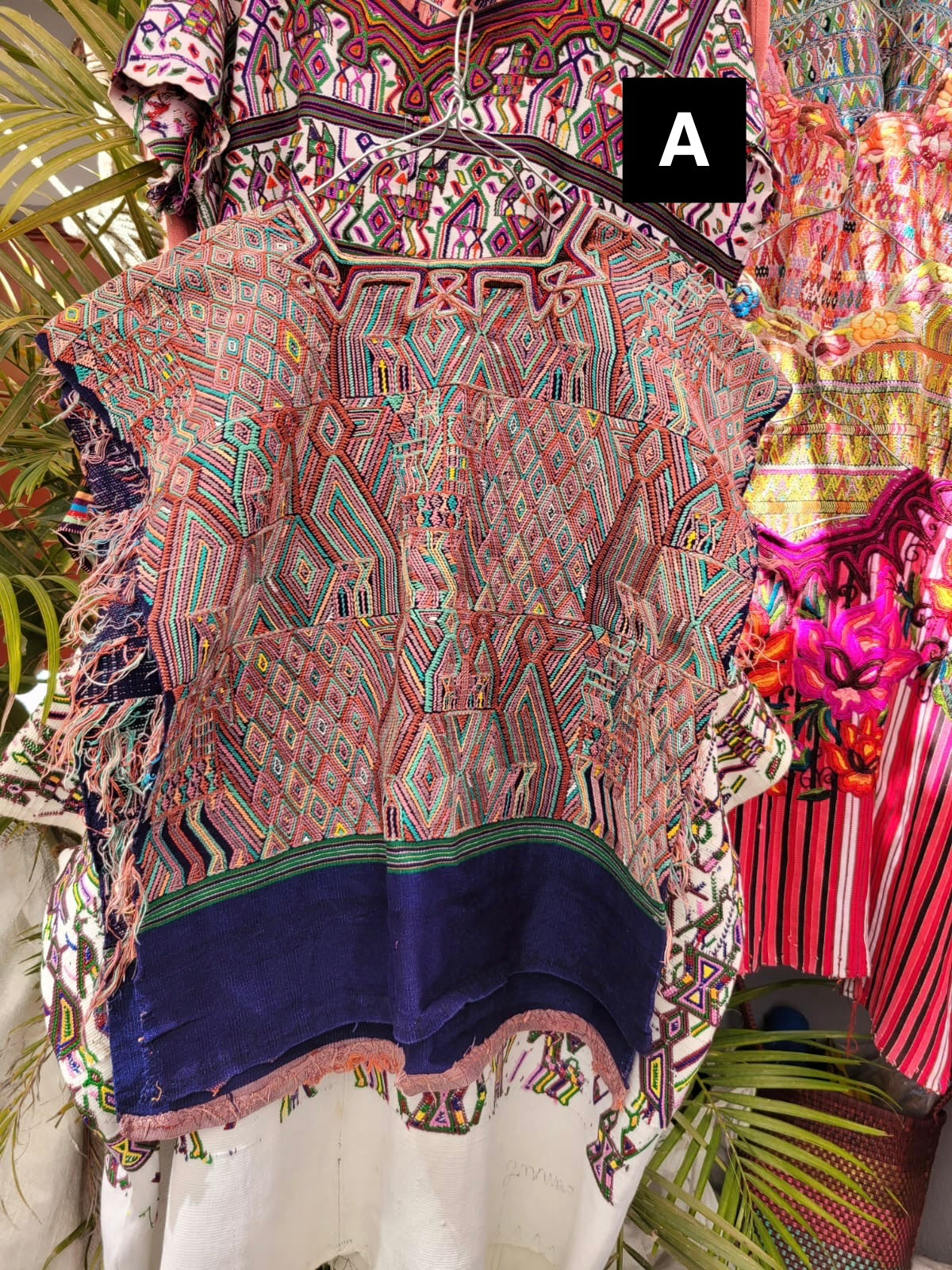 Blue and pink Nebaj huipil
