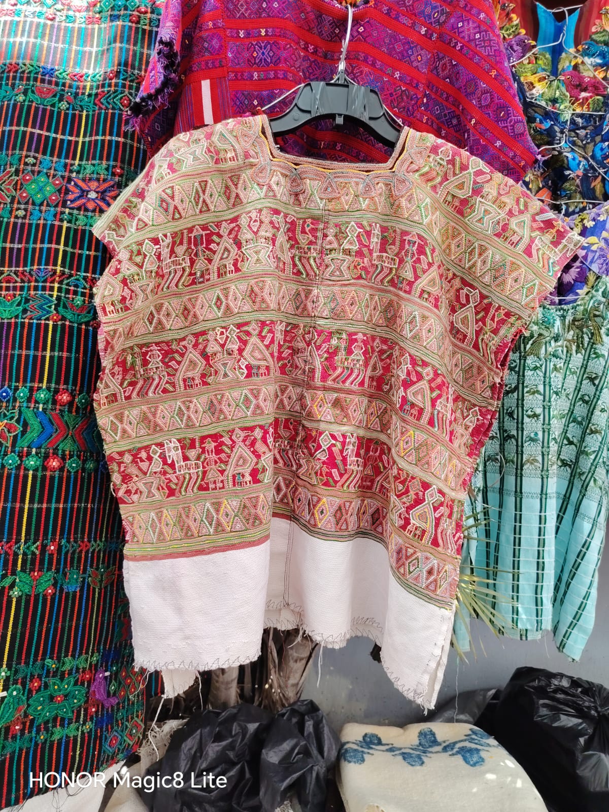 Traditional red Nebaj huipil (reserved for April)
