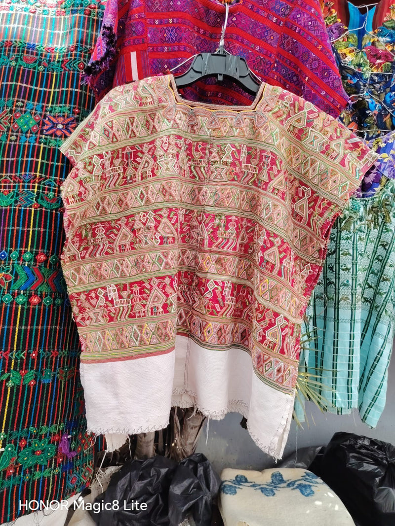 Traditional red Nebaj huipil (reserved for April)