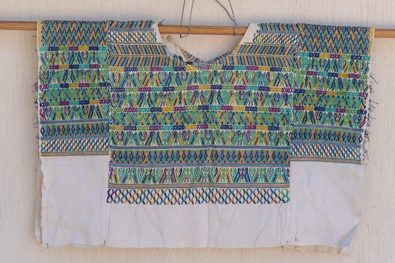 Blue and white San Juan Cotzal huipil for Anne