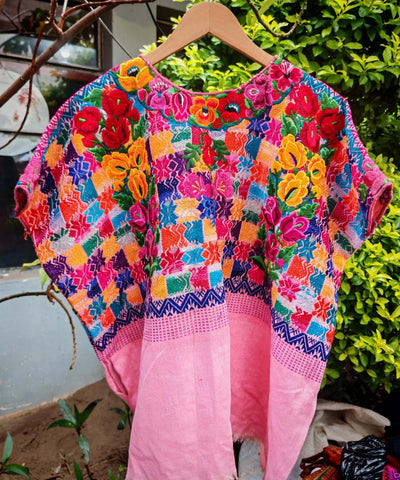 Colorful on pink Xela huipil