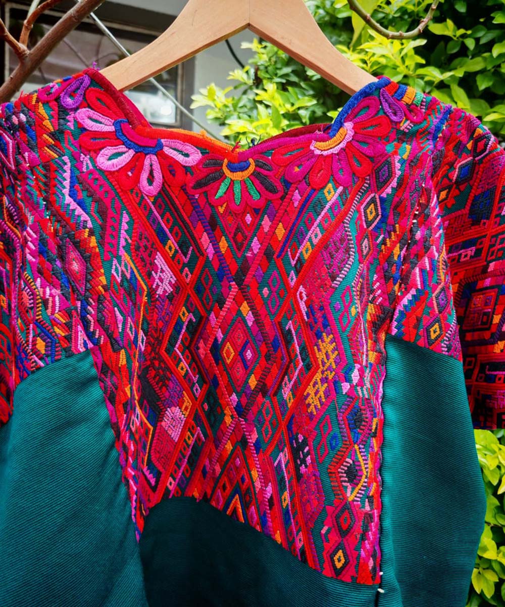 Hot pink and teal green Chichi huipil