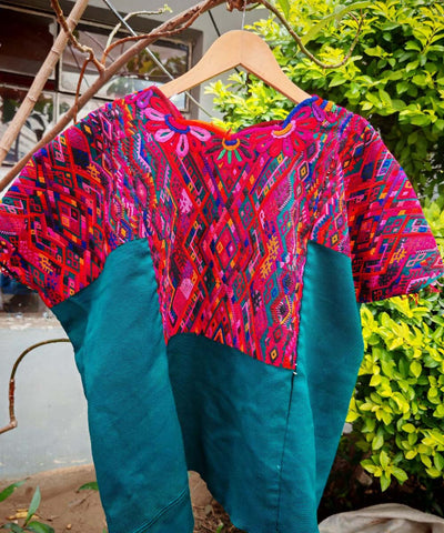Hot pink and teal green Chichi huipil