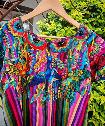 Rainbow Santiago huipil with quetzales