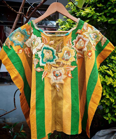 Green and gold Santiago floral huipil