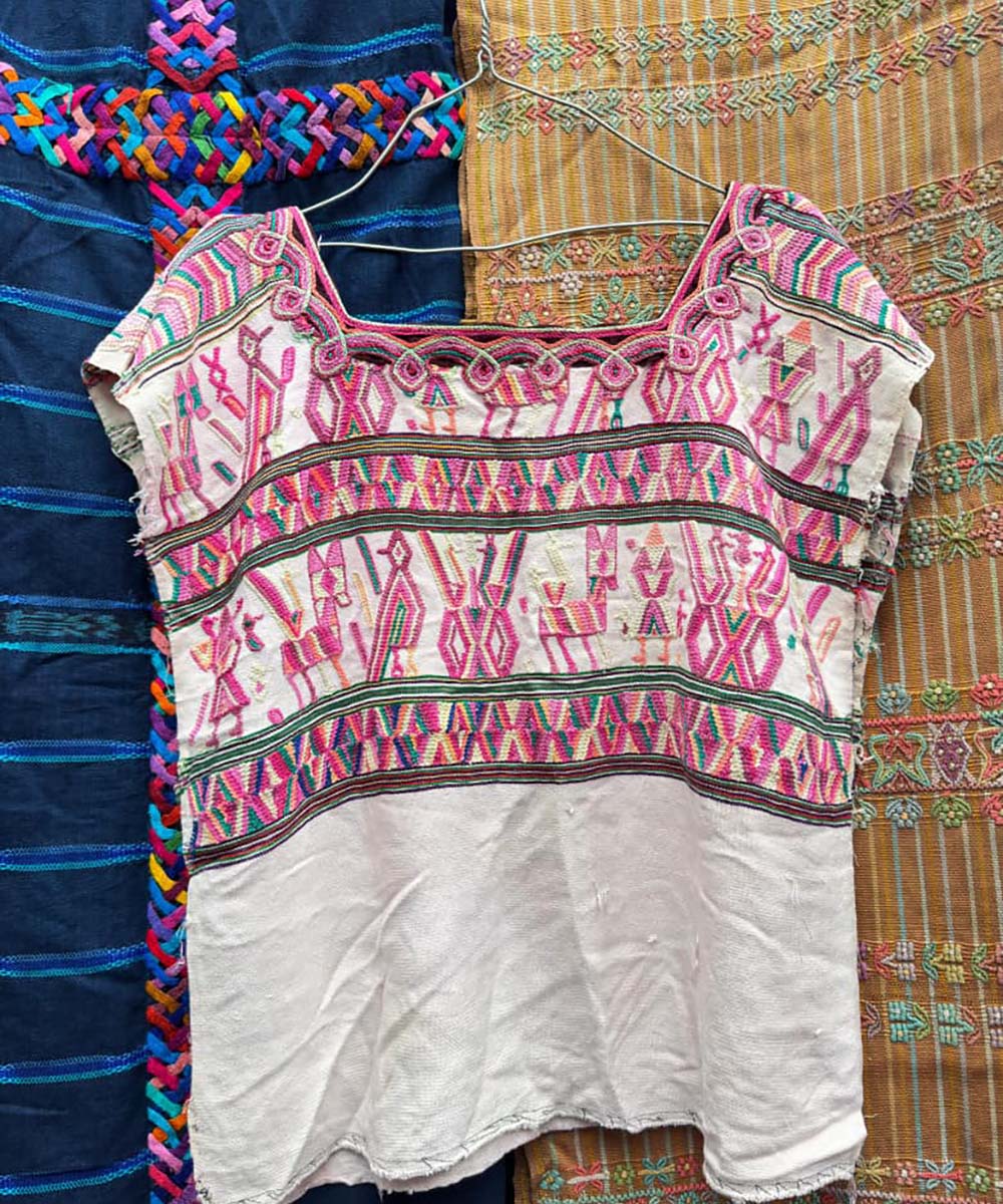 Pink and white Nebaj huipil