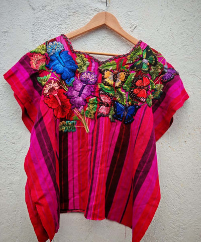 Hot pink Santiago huipil with butterflies