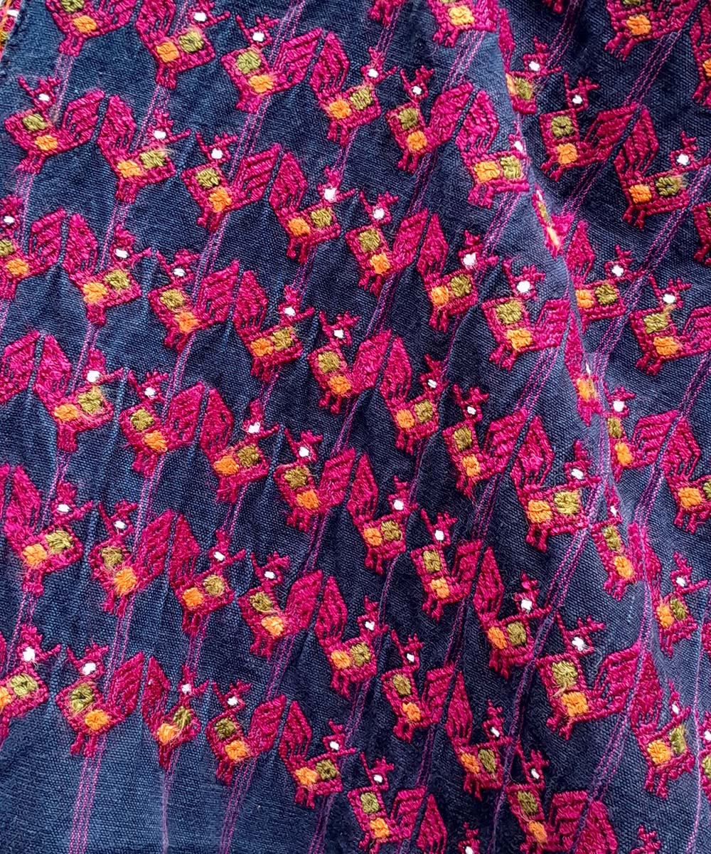 Indigo Nahuala huipil with hot pink chickens