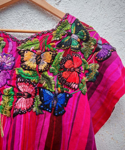 Hot pink Santiago huipil with butterflies