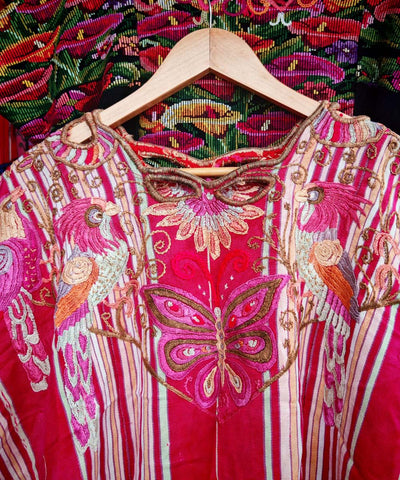 Red Chichi huipil with parrots