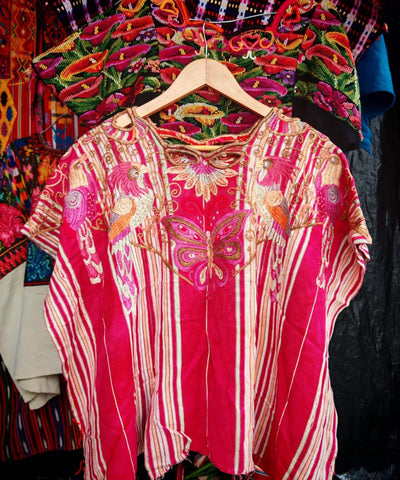 Red Chichi huipil with parrots