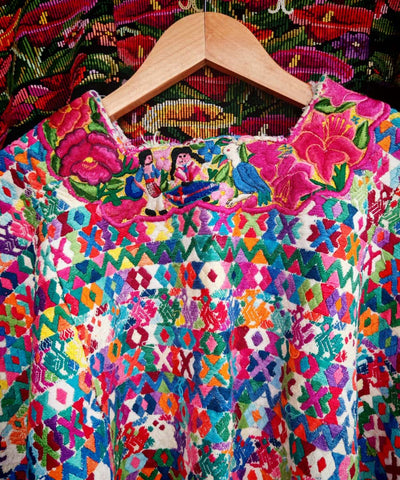 Colorful Coban huipil with floral neckline