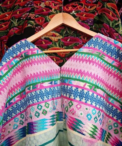 Pink and blue Comalapa huipil