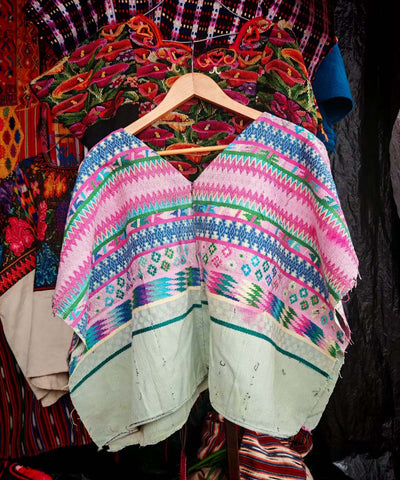 Pink and blue Comalapa huipil