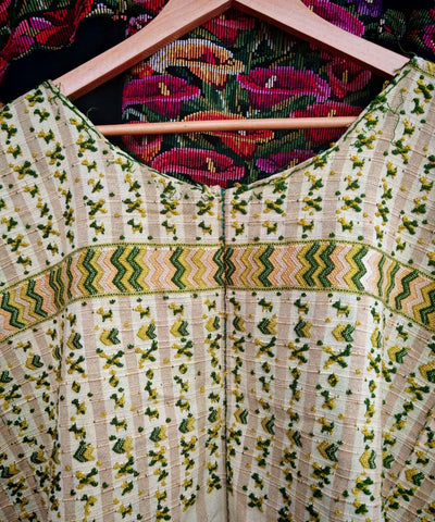 Green and gold San Lucas huipil