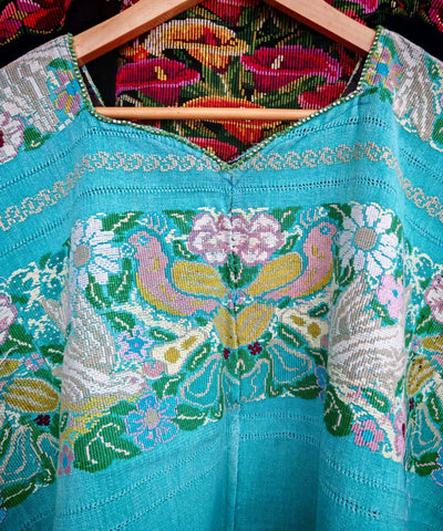 Aqua huipil with doves