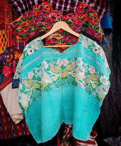 Aqua huipil with doves