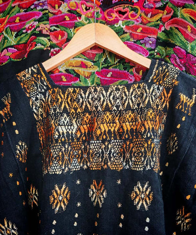 Black and gold Coban huipil