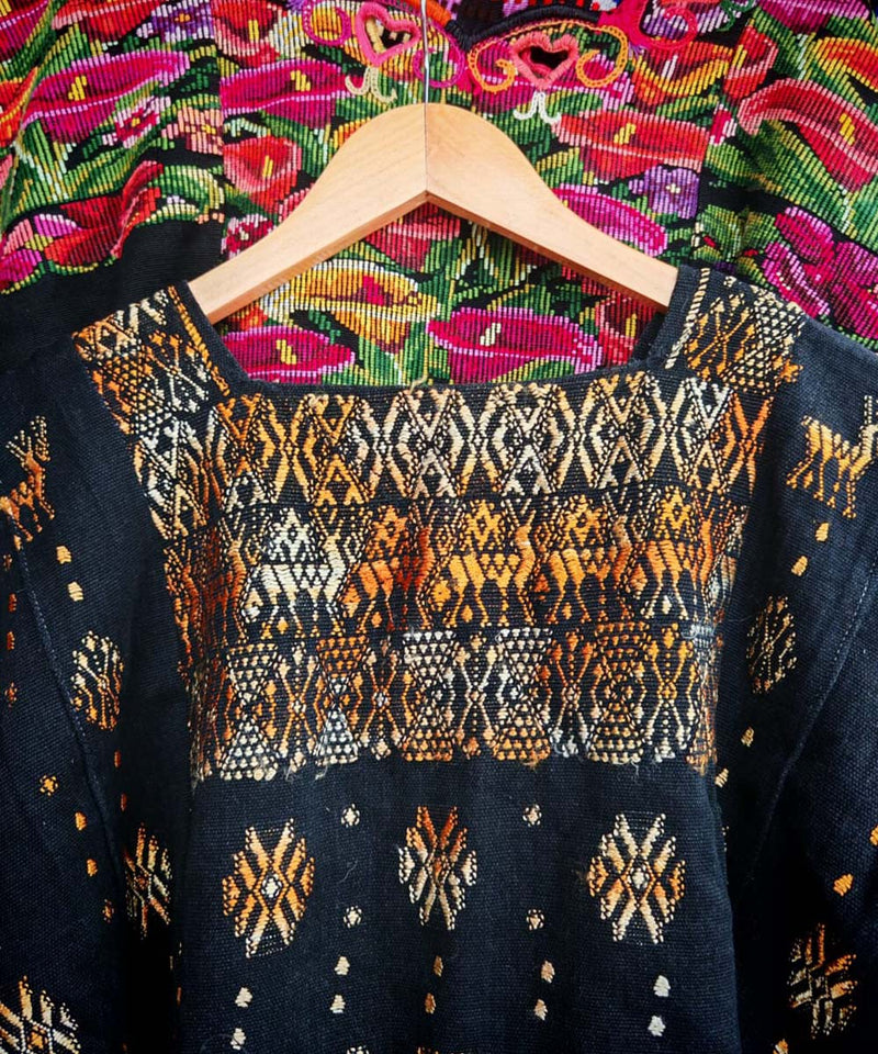 Black and gold Coban huipil