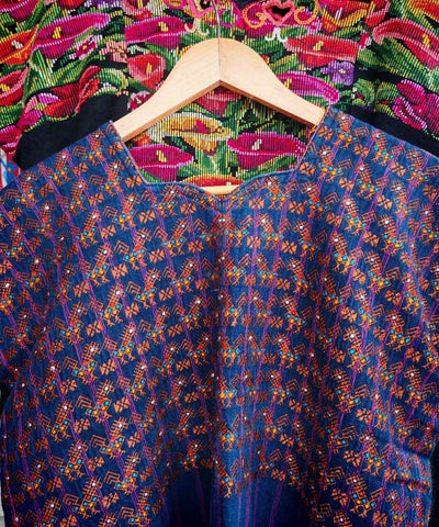 Nahuala huipil with orange horses