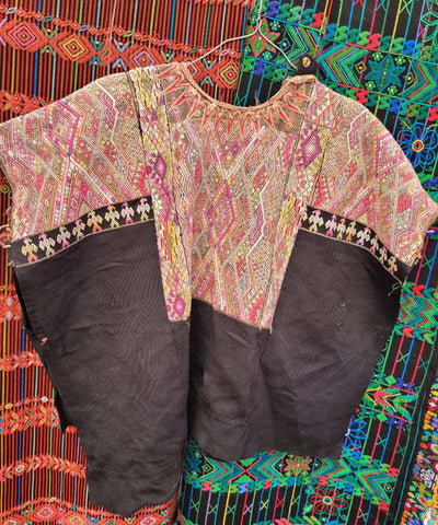 Black Chichi huipil with geometric pattern