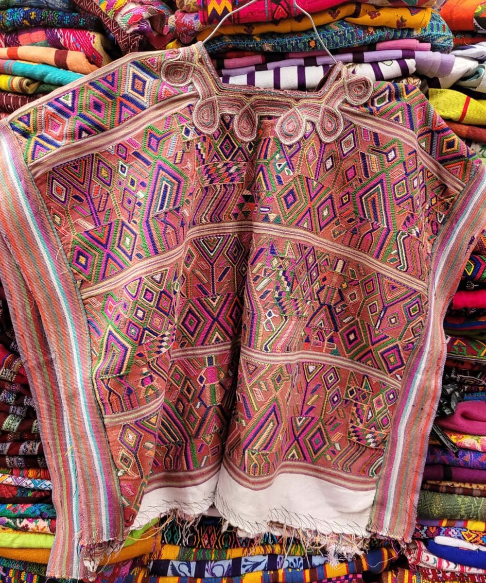 Colorful on clay Nebaj huipil