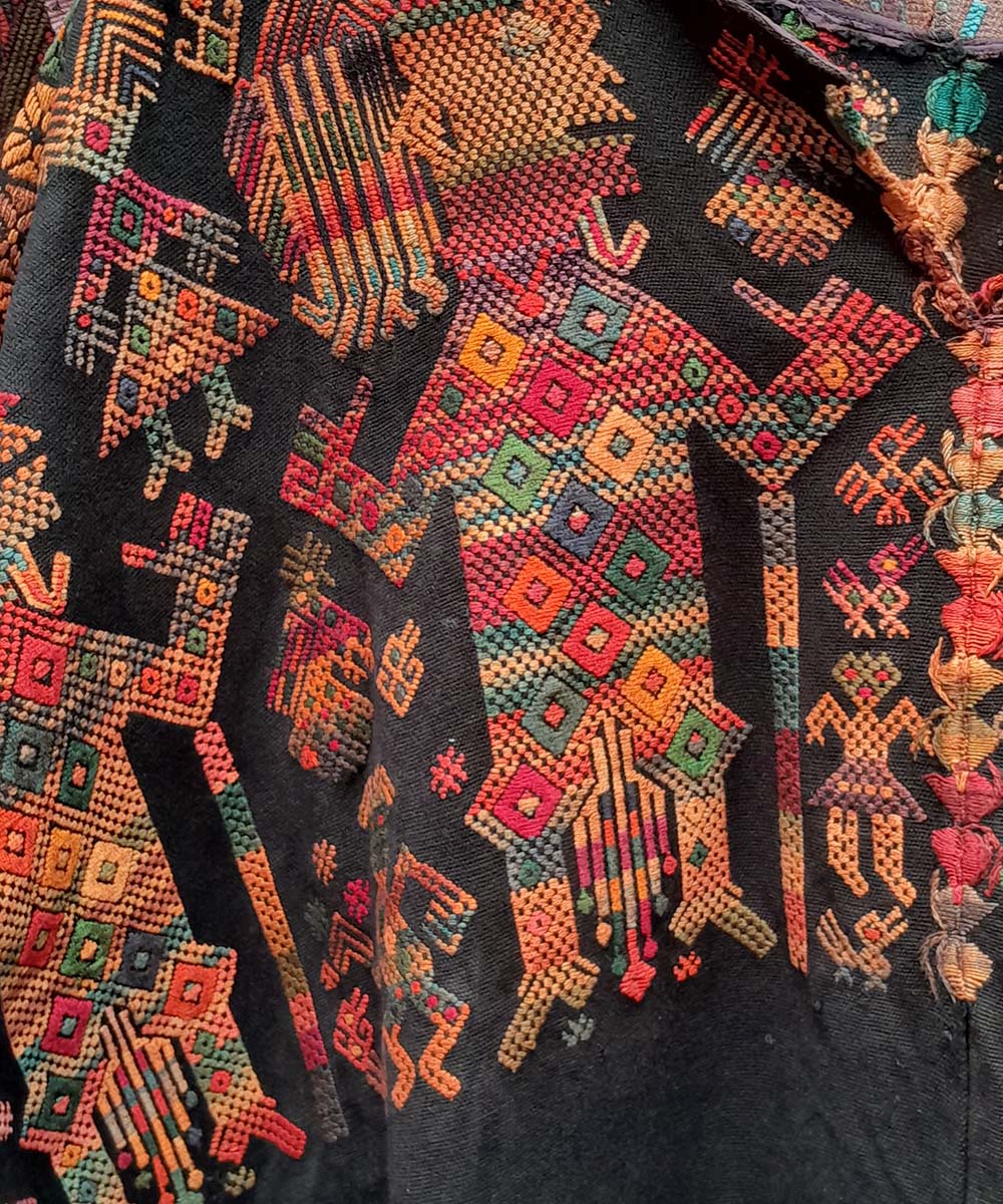 Nahuala huipil with dancing Mayan men