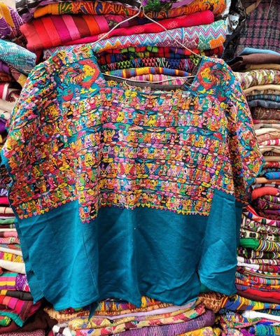 Teal blue San Juan Cotzal huipil