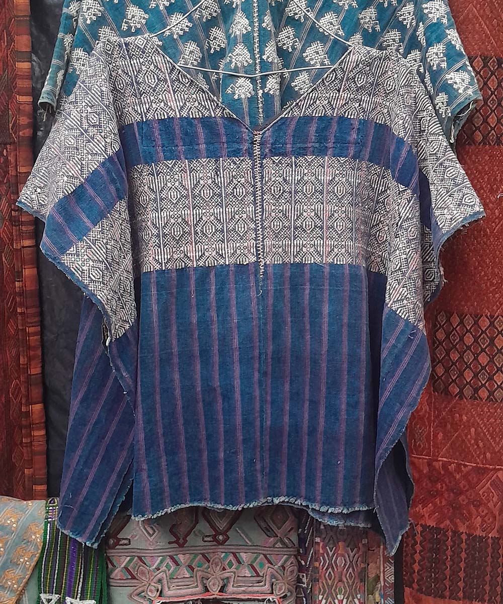 Indigo Xejuyub huipil with tiny bird motifs