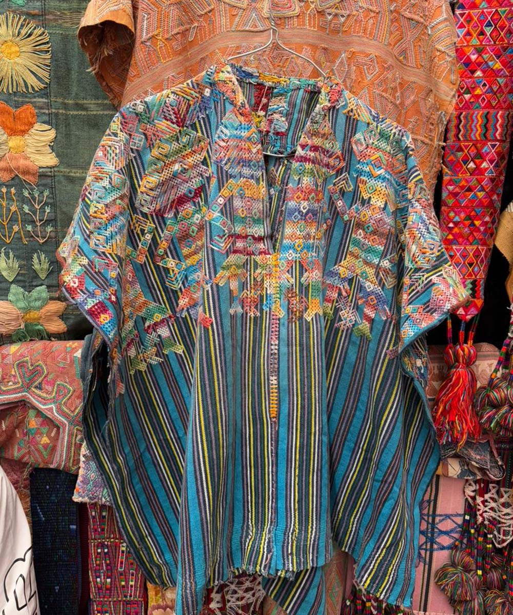 Indigo Nahuala huipil with dancing men