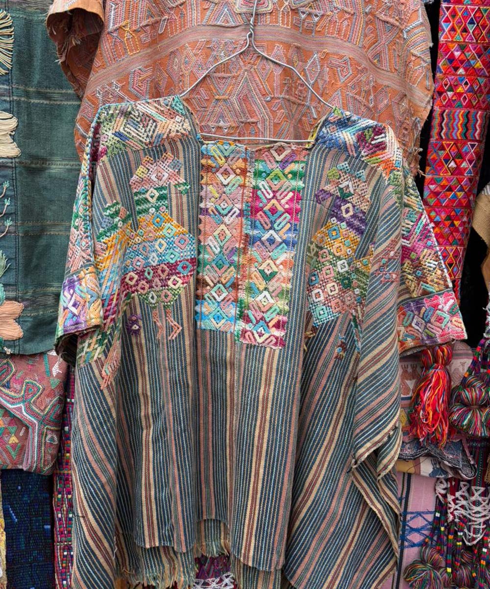 Indigo and brown Nahuala huipil with peacocks