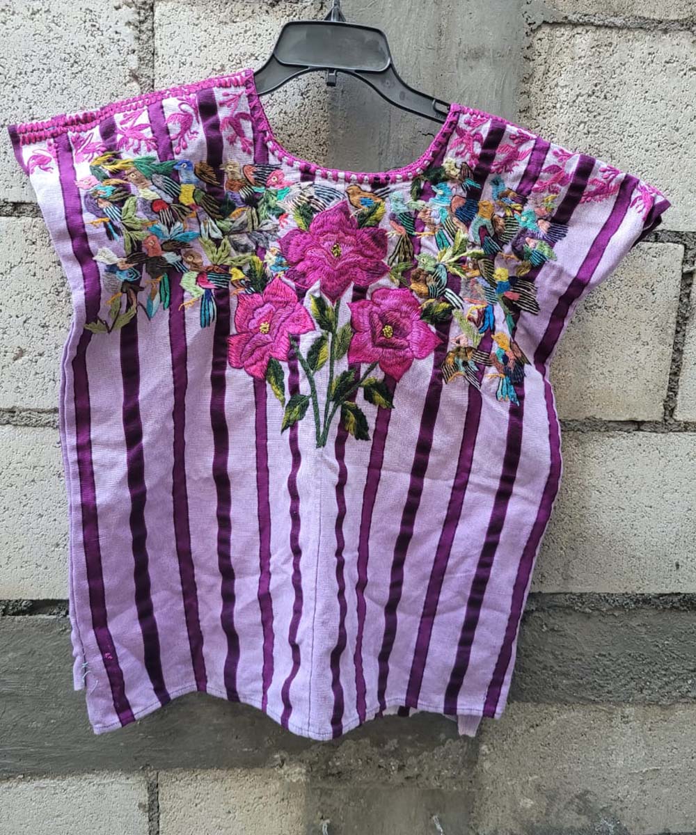 Lilac and pink Santiago huipil