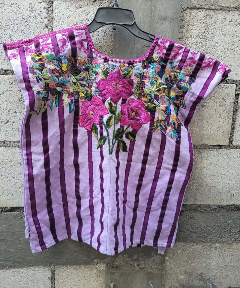 Lilac and pink Santiago huipil