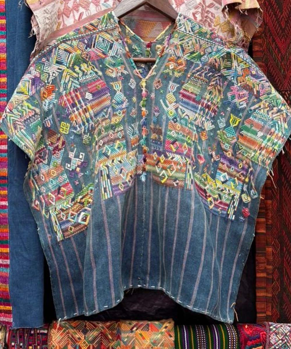 Indigo Nahuala huipil with men in ceremony