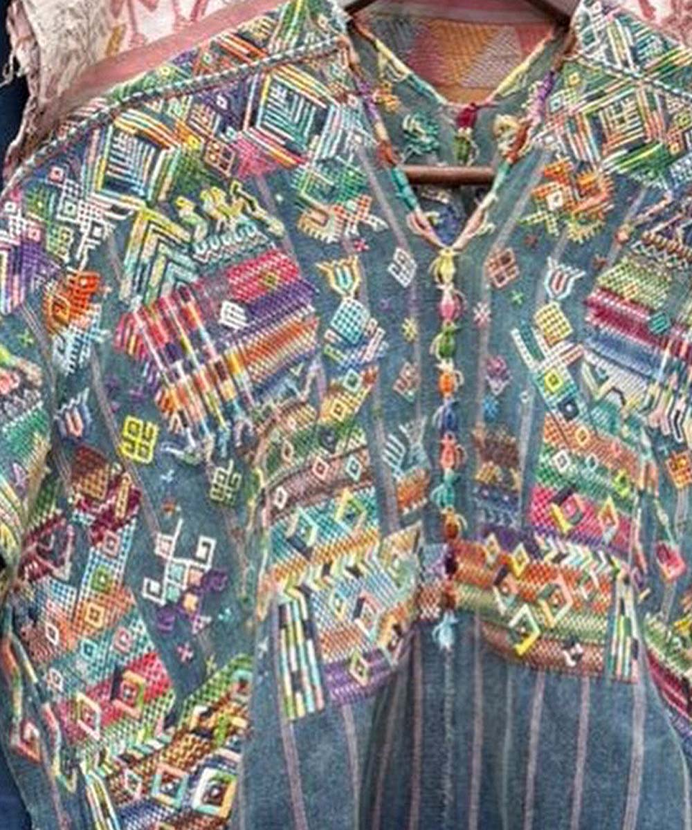 Indigo Nahuala huipil with men in ceremony