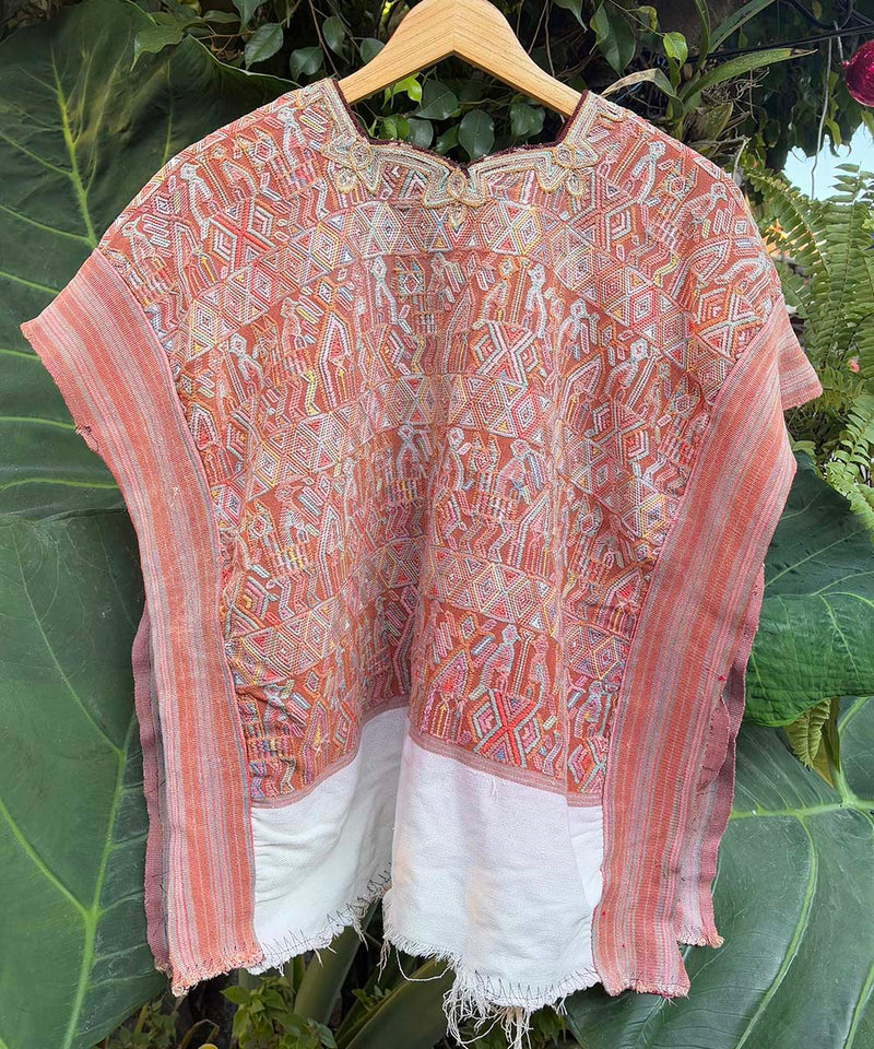 Coral Nebaj huipil with striped side panels
