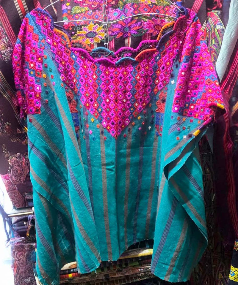 Pink and turquoise huipil