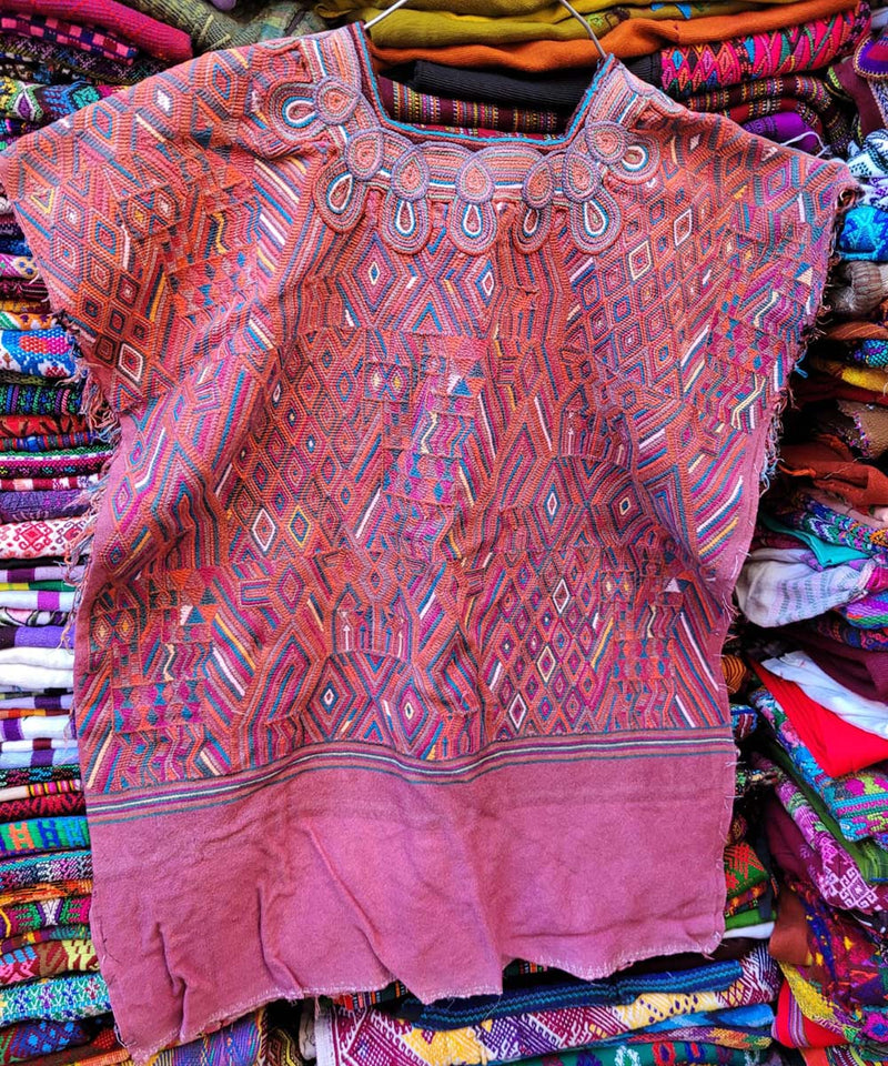 Pink and orange Nebaj huipil