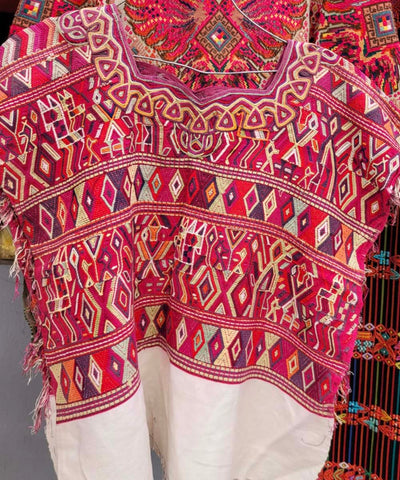 Red and white Nebaj huipil