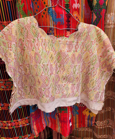 Pale pink and green Coban huipil