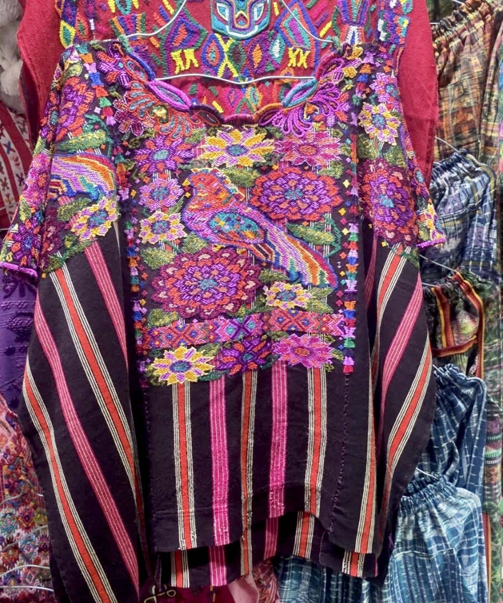 Striped Chichi huipil with parrots