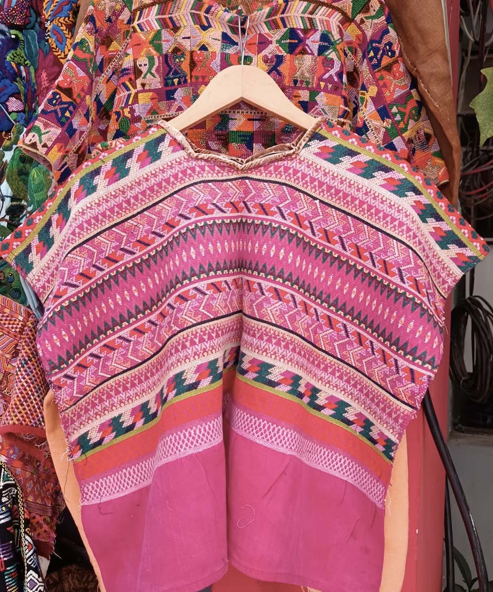 Bright pink Comalapa huipil