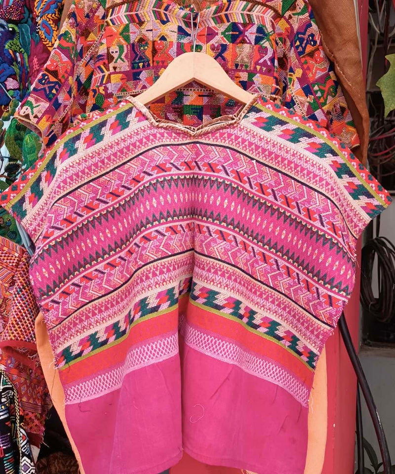 Bright pink Comalapa huipil