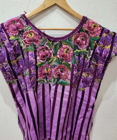 Purple Santiago huipil with pink flowers
