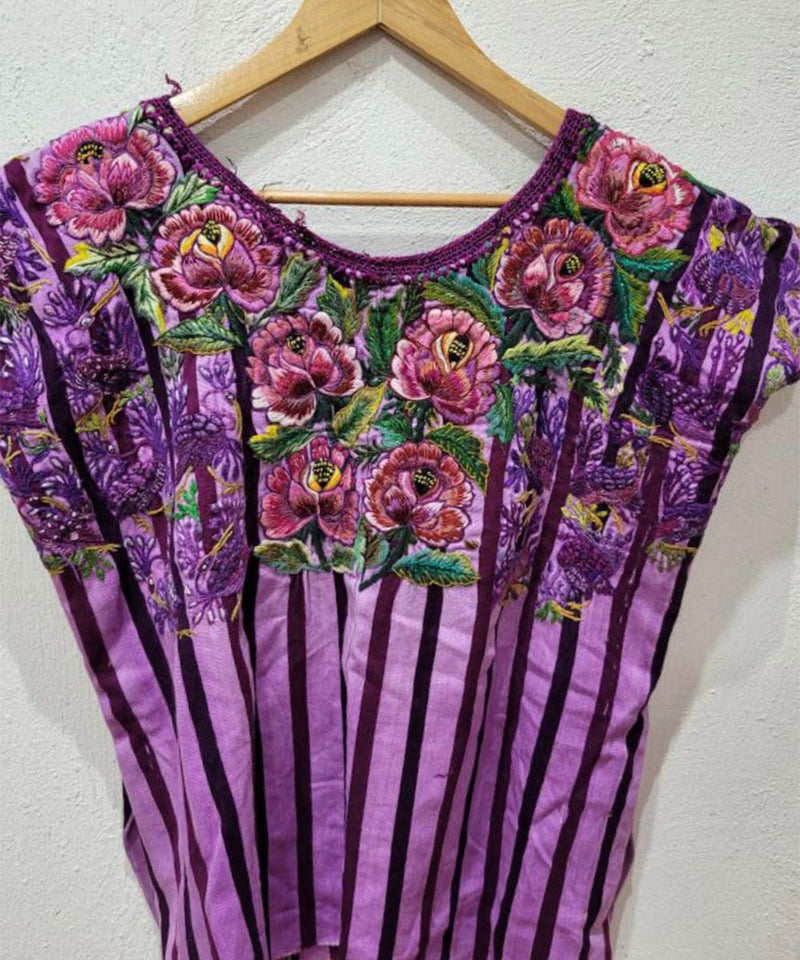 Purple Santiago huipil with pink flowers