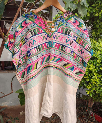 Colorful pink Comalapa huipil