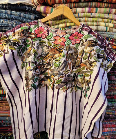 Santiago huipil with garden like embroidery